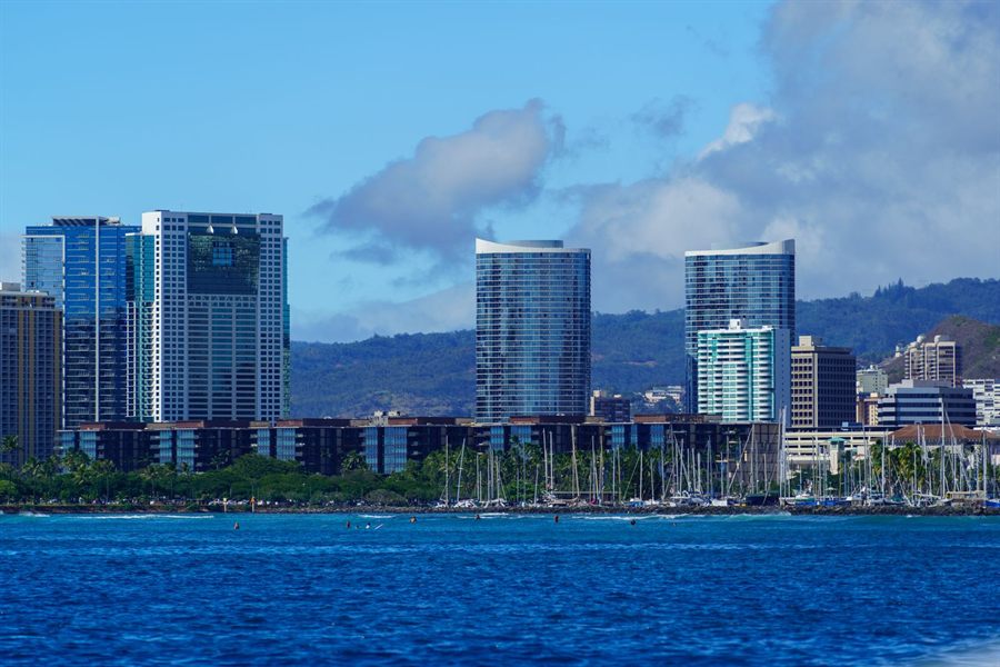 Honolulu high-rises above the harbor shoreline, near the Honolulu cruise terminal